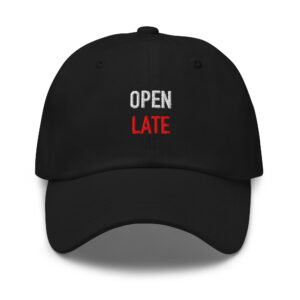 Black embroidered dad hat reading “OPEN LATE.” in white and red.