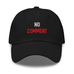 Black embroidered dad hat reading “NO COMMENT.” in white and red.