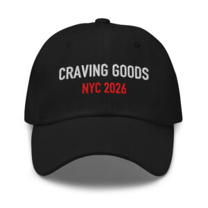 Black embroidered dad hat reading “CRAVING GOODS.” in white and red.