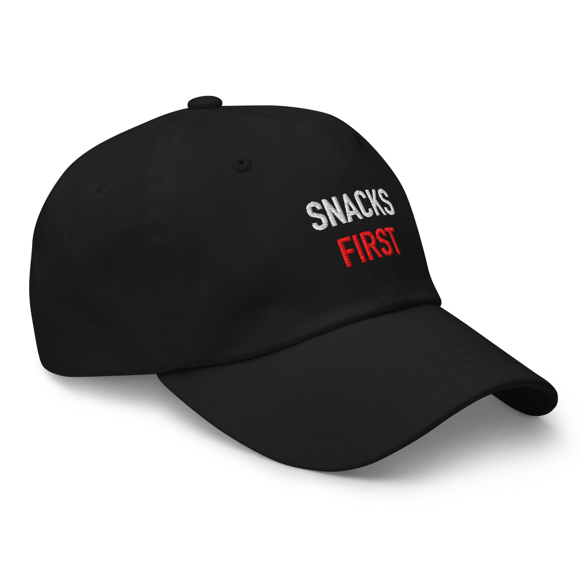 Right-front view of black embroidered dad hat for the “SNACKS FIRST.” design.