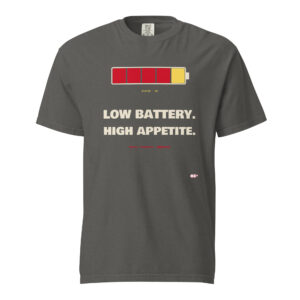 Front product mockup of the Low Battery, High Appetite heavyweight tee.